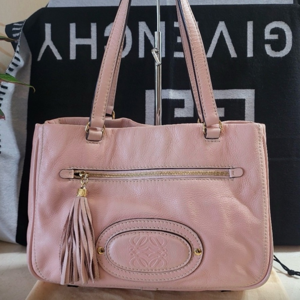 Loewe Pink Leather bag w/ large matching tassel. Very good pre-owned condition.